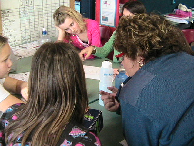 Senior Constable Diana Hayden discusses an activity during a DARE lesson.